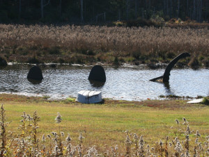 Loch Ness Monster in pond along Rt. 390.